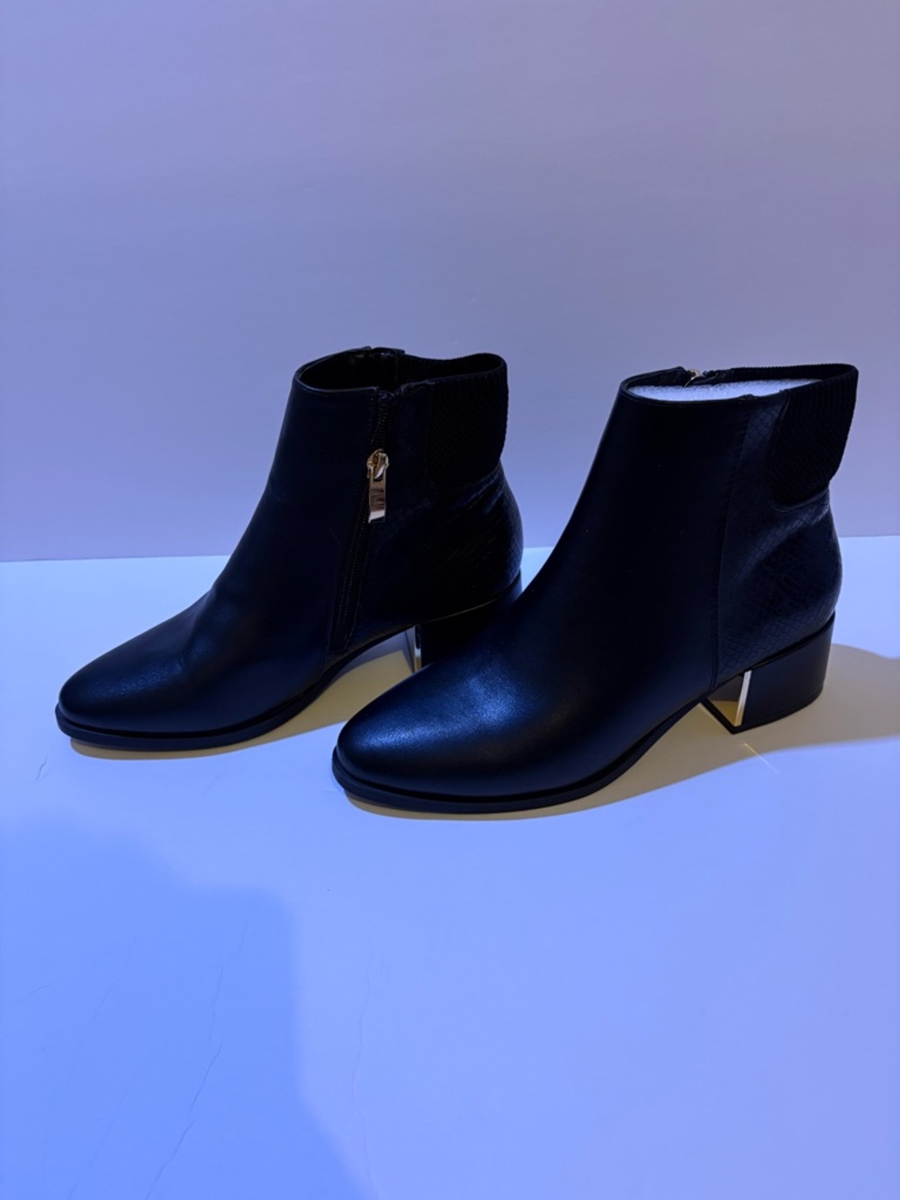 Women's Black Leather Ankle Booties with Gold Accent Heel
